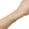 Bracelet Dinh Van, modèle "Serrure" en or jaune, un diamant. sold by 58 Facettes