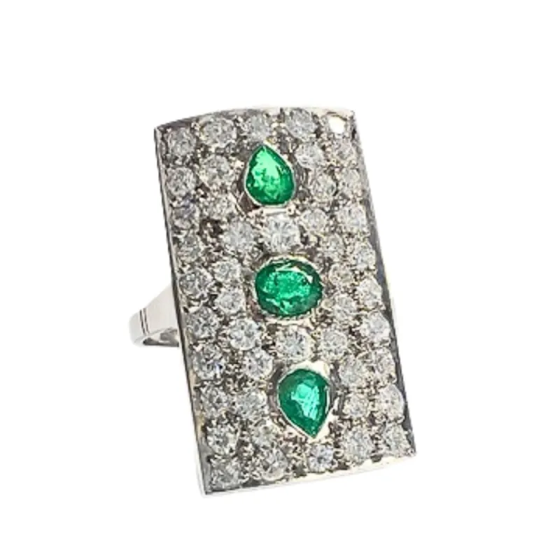 Bague Art Déco émeraudes diamants sold by 58 Facettes