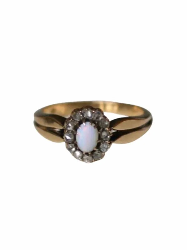 Bague marguerite or rose, opale et diamants made by 58 Facettes