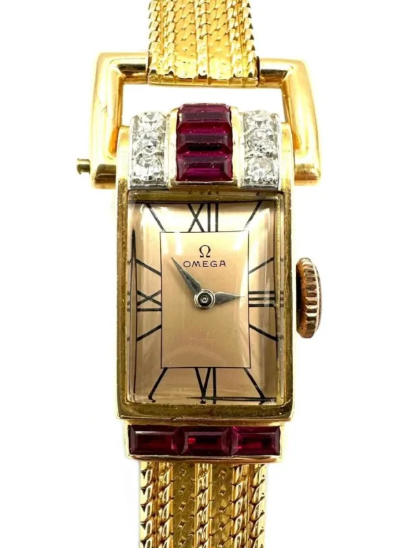 OMEGA/UNIVERSAL - Montre ancienne Art-Déco en or rose, rubis et diamants sold by 58 Facettes