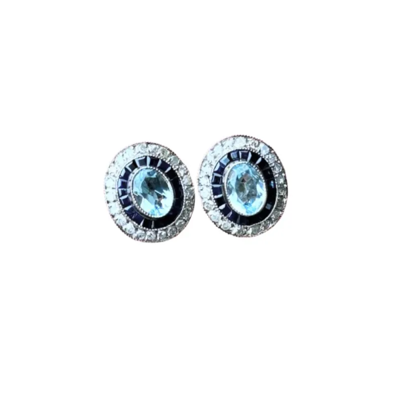 Boucles d'oreilles style Art Déco platine aigues-marines saphirs diamants sold by 58 Facettes