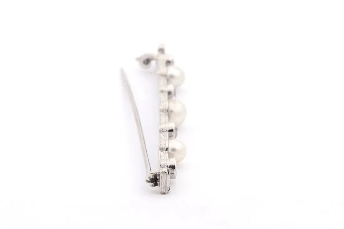 Broche Art Déco en or blanc sertie de perles fines, d'onyx et de diamants sold by 58 Facettes product image thumbnail 5