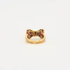 Bague Nœud Diamants et Rubis sold by 58 Facettes