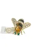 Broche or jaune et pierres précieuses signé René Kreiss sold by 58 Facettes
