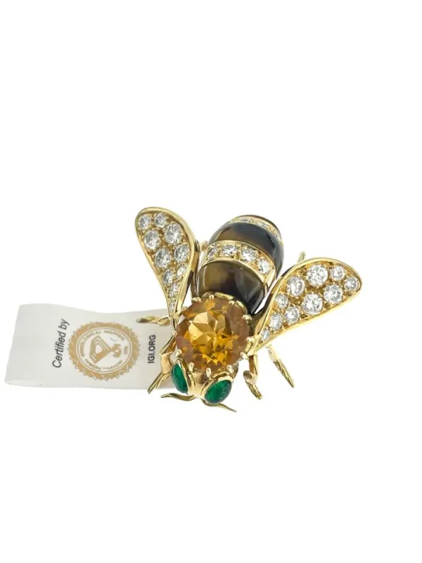 Broche or jaune et pierres précieuses signé René Kreiss sold by 58 Facettes