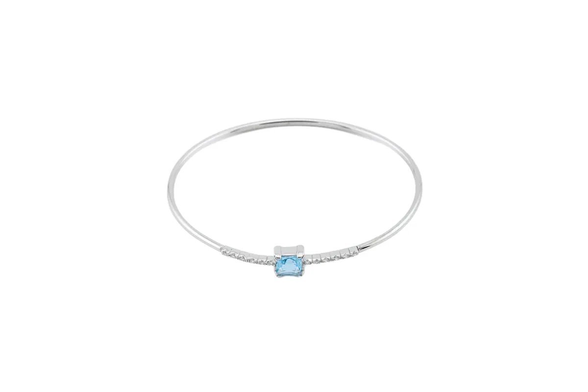 Bracelet rigide en or blanc avec topaze bleue et zircons sold by 58 Facettes