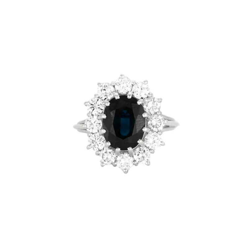 Bague marguerite saphir entourage diamants en or blanc sold by 58 Facettes