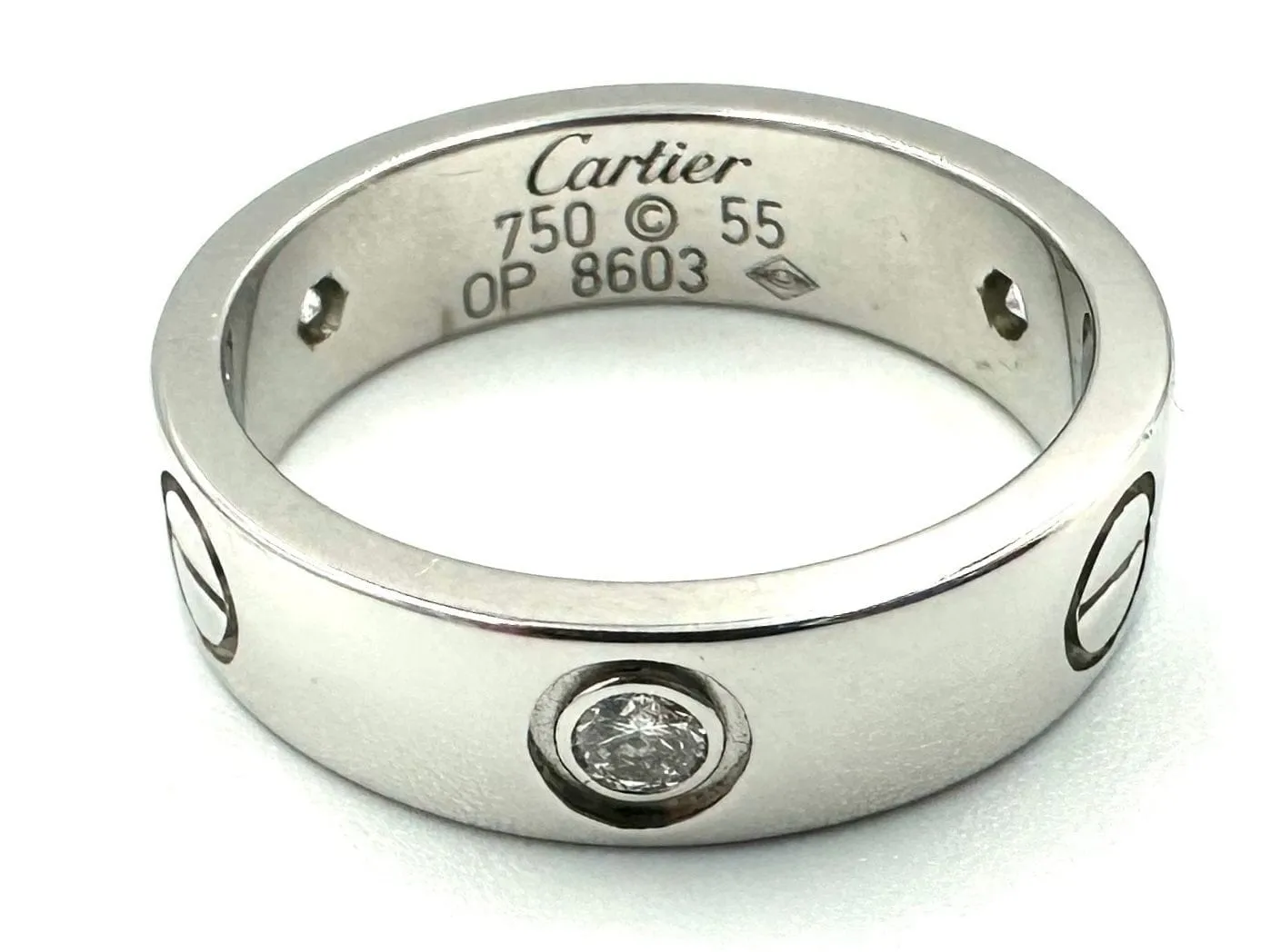 CARTIER. Collection "LOVE", bague en or blanc 18K et 3 diamants sold by 58 Facettes