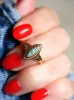 Bague marquise ancienne en or rose et turquoises sold by 58 Facettes
