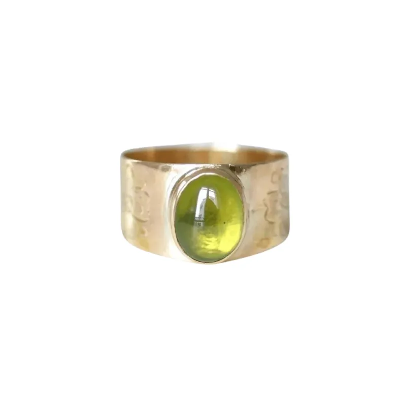 Bague bandeau or rose et cabochon péridot sold by 58 Facettes