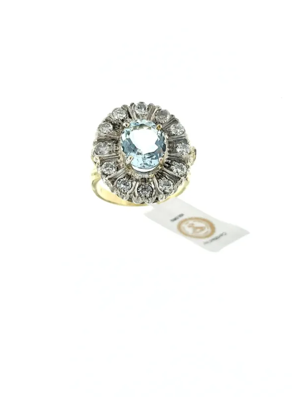Bague en or jaune et argent , aigue-marine et diamants sold by 58 Facettes