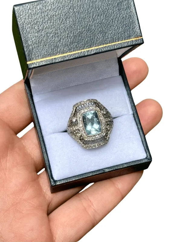 Bague de style Art Déco en platine avec aigue-marine centrale et diamants. sold by 58 Facettes