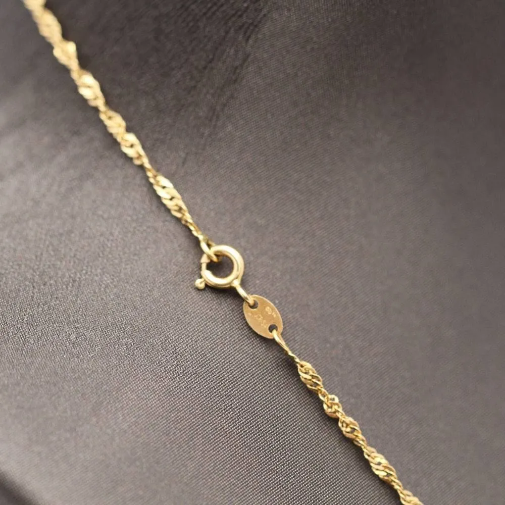 Chaîne Singapour avec pendentif en or 18 carats avec pendentif amour sold by 58 Facettes product image thumbnail 4