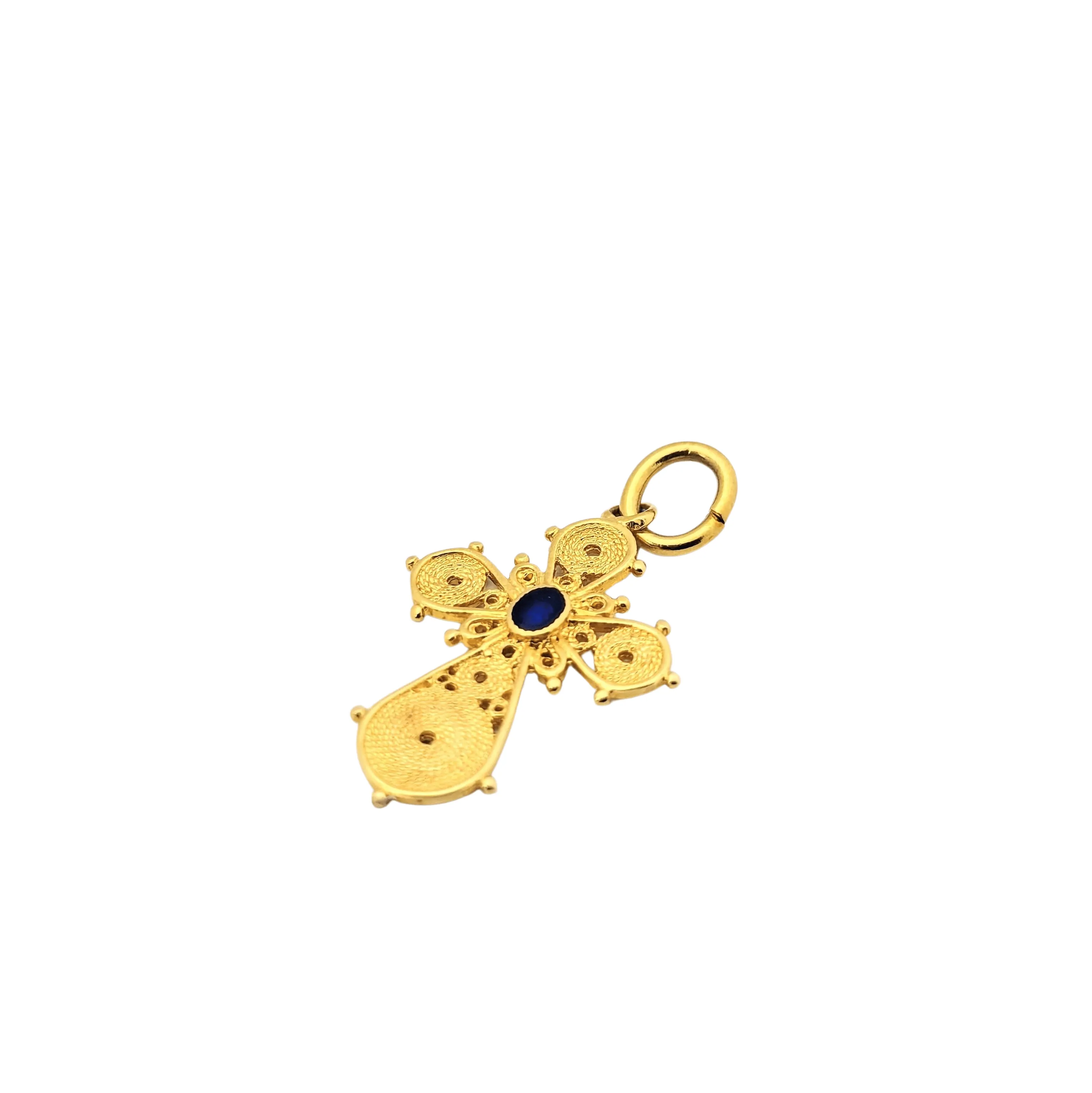 Pendentif croix en or jaune 18 carats sold by 58 Facettes