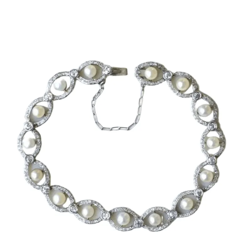 Bracelet Art Deco platine, diamants, et perles sold by 58 Facettes