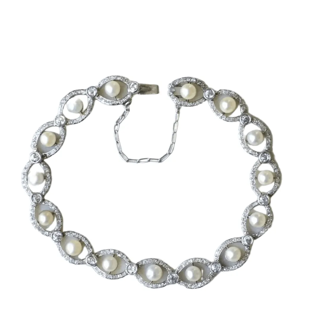 Bracelet Art Deco platine, diamants, et perles sold by 58 Facettes