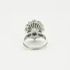 Bague en or gris ornée d'une émeraude et diamants sold by 58 Facettes