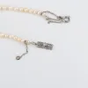 Collier ancien de perles de cultures blanches, fermoir diamants sold by 58 Facettes