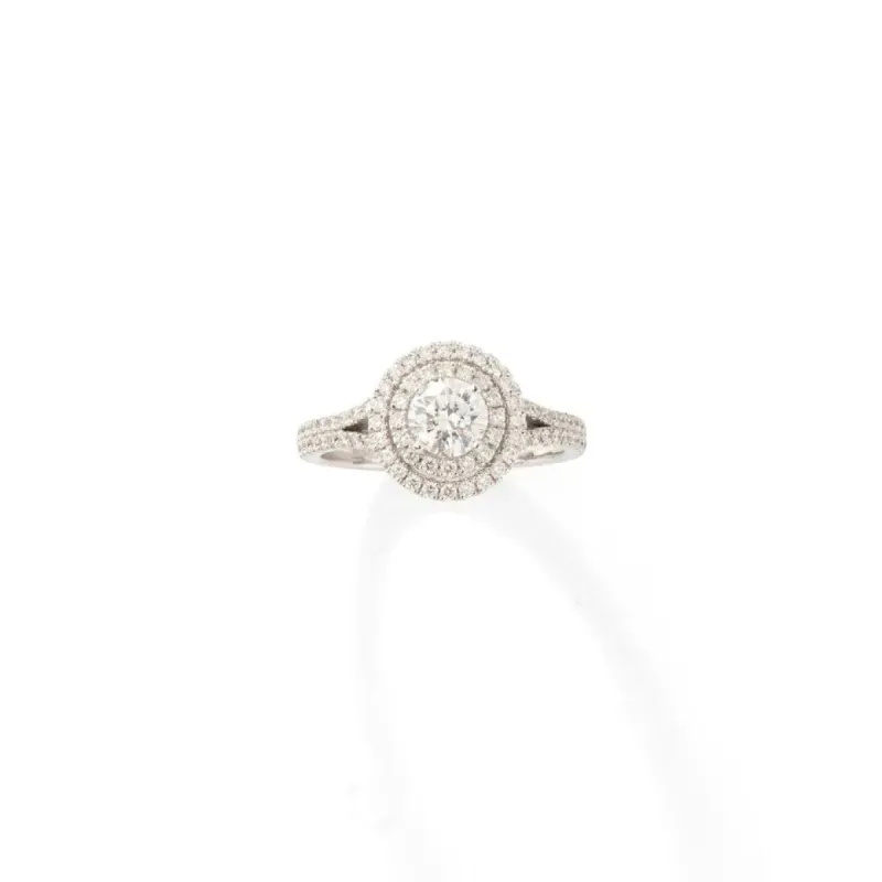 Bague solitaire en or blanc et ornée de diamants taille brillant. sold by 58 Facettes
