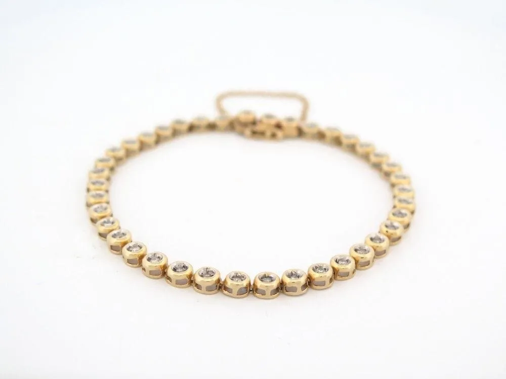vintage bracelet tennis serti de 39 diamants 1ct en or jaune 18k sold by 58 Facettes product image thumbnail 2