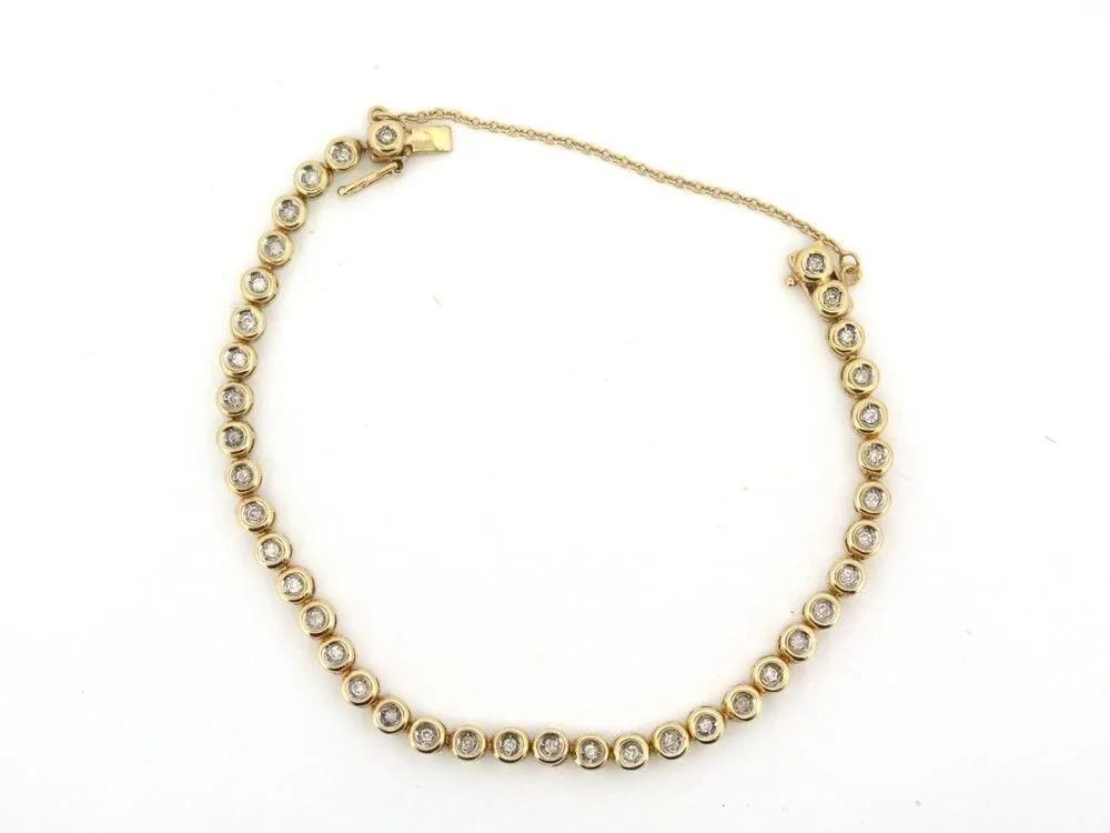 vintage bracelet tennis serti de 39 diamants 1ct en or jaune 18k sold by 58 Facettes product image thumbnail 3