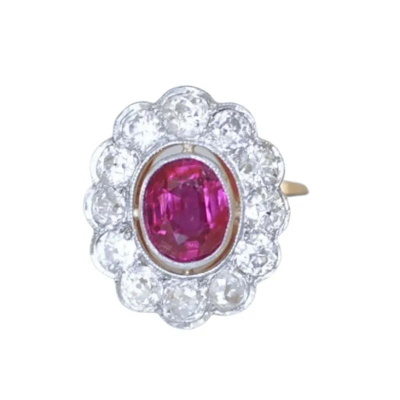 Bague marguerite, rubis, diamants sold by 58 Facettes