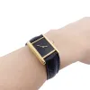 Montre Cartier "Tank Must" argent plaqué or, cadran laqué noir. sold by 58 Facettes