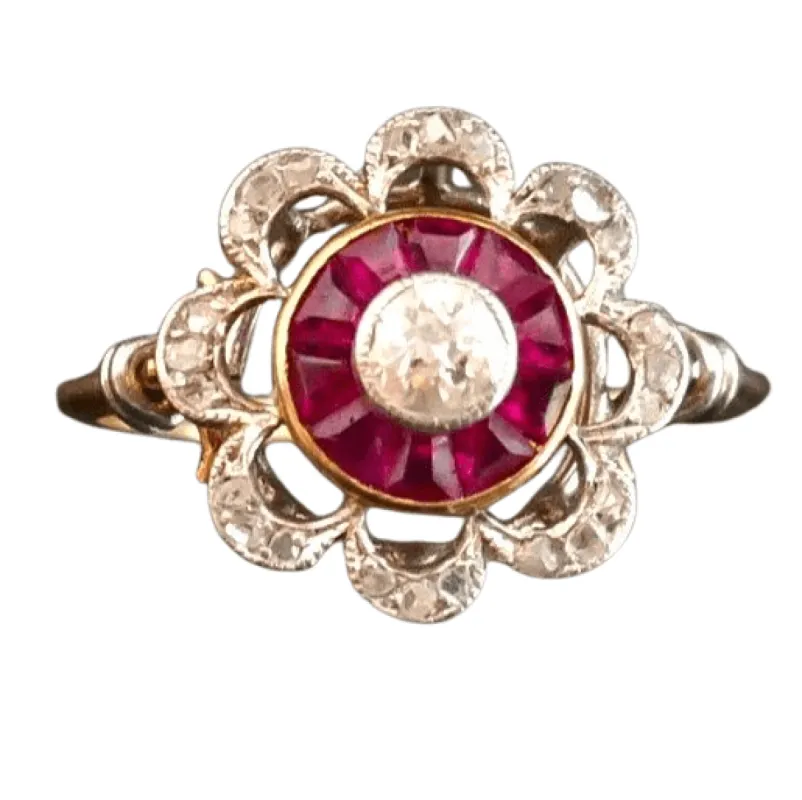 Bague Ornée d'un Diamant, entourage de Rubis Calibrés sold by 58 Facettes