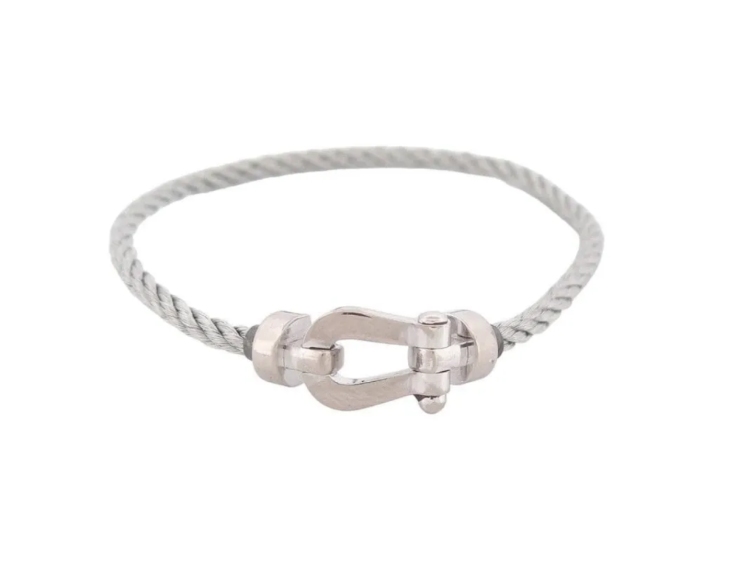 bracelet FRED force 10 mm manille en or blanc cable acier t14 sold by 58 Facettes