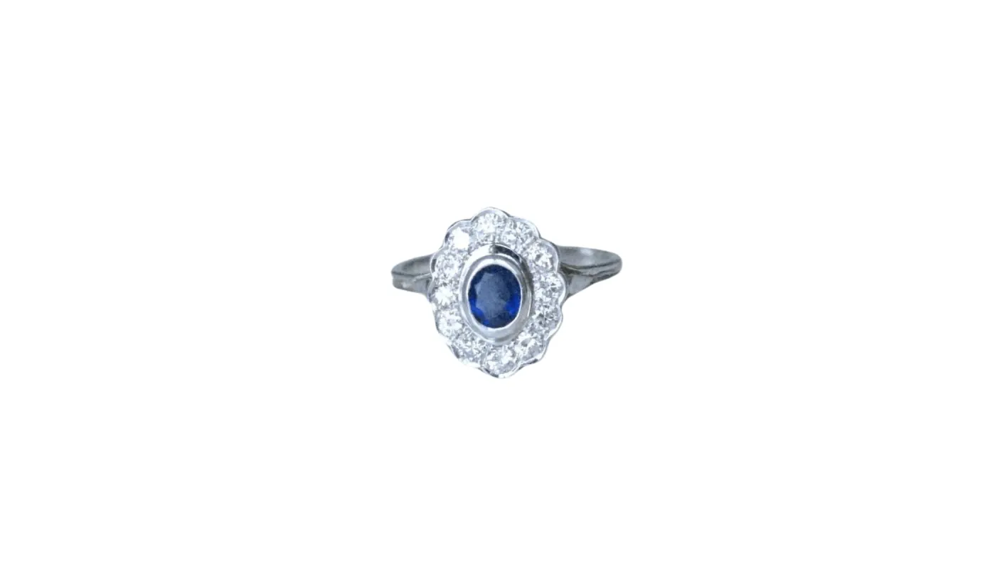 Bague marguerite saphir entourage diamants sold by 58 Facettes