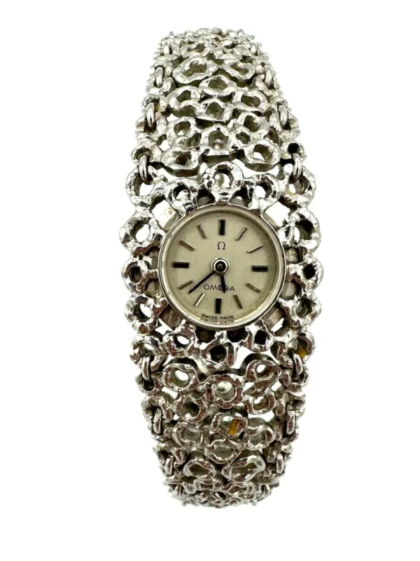 GILBERT ALBERT/OMEGA - Montre de dame vintage en or blanc made by 58 Facettes