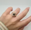 Bague or jaune sertie de diamants et d'un saphir sold by 58 Facettes