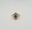 Bague or jaune sertie de diamants et d'un saphir sold by 58 Facettes