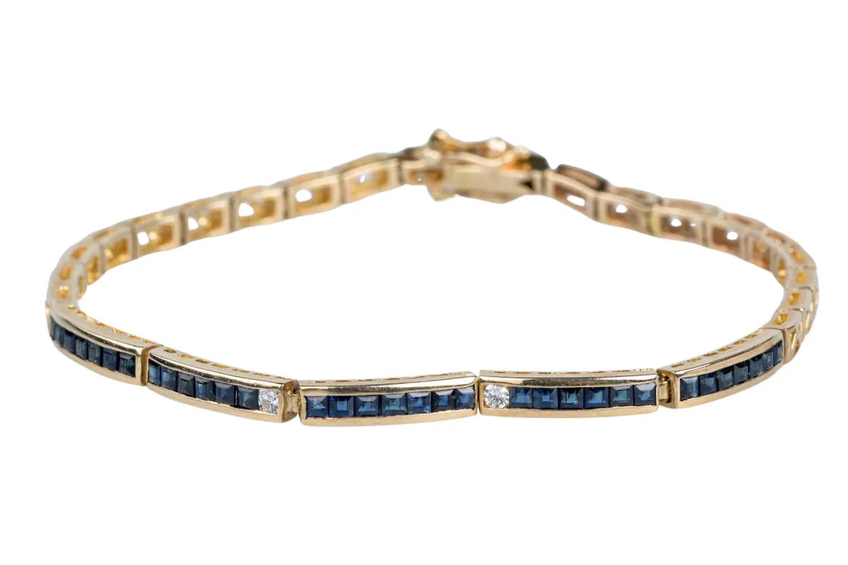 Bracelet en or jaune saphir diamants sold by 58 Facettes