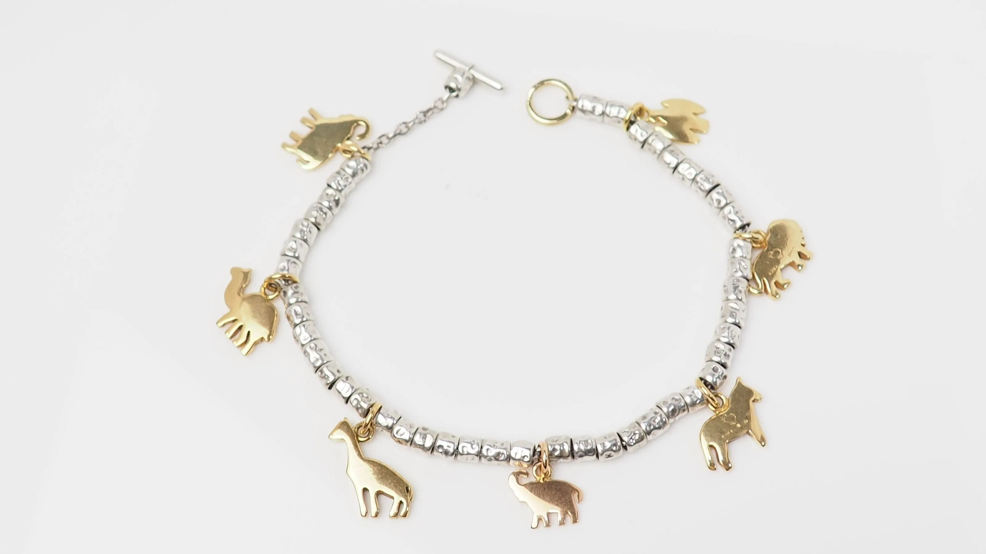 Bracelet breloques Dodo en or jaune et argent sold by 58 Facettes product image thumbnail 3