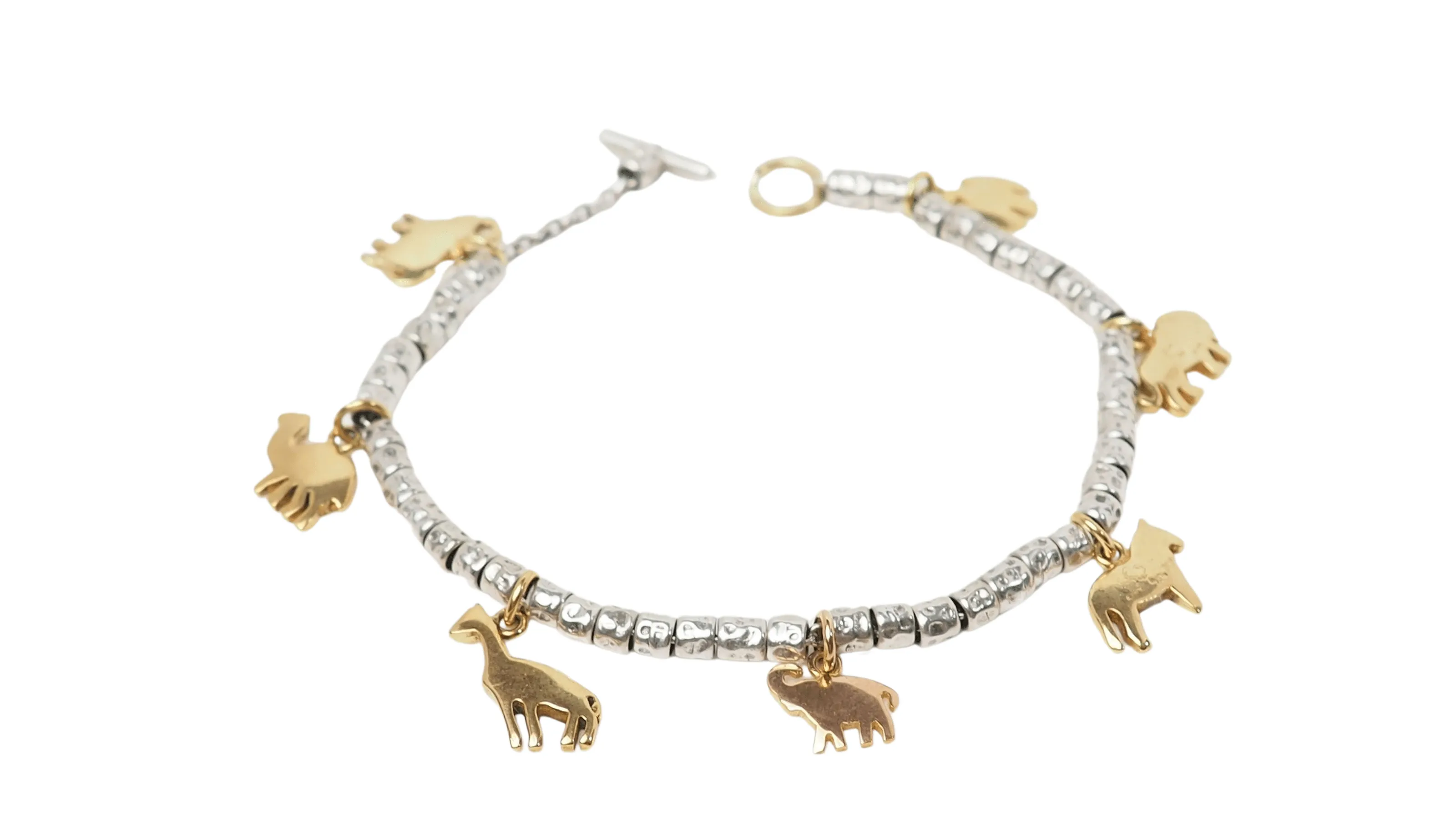 Bracelet breloques Dodo en or jaune et argent sold by 58 Facettes