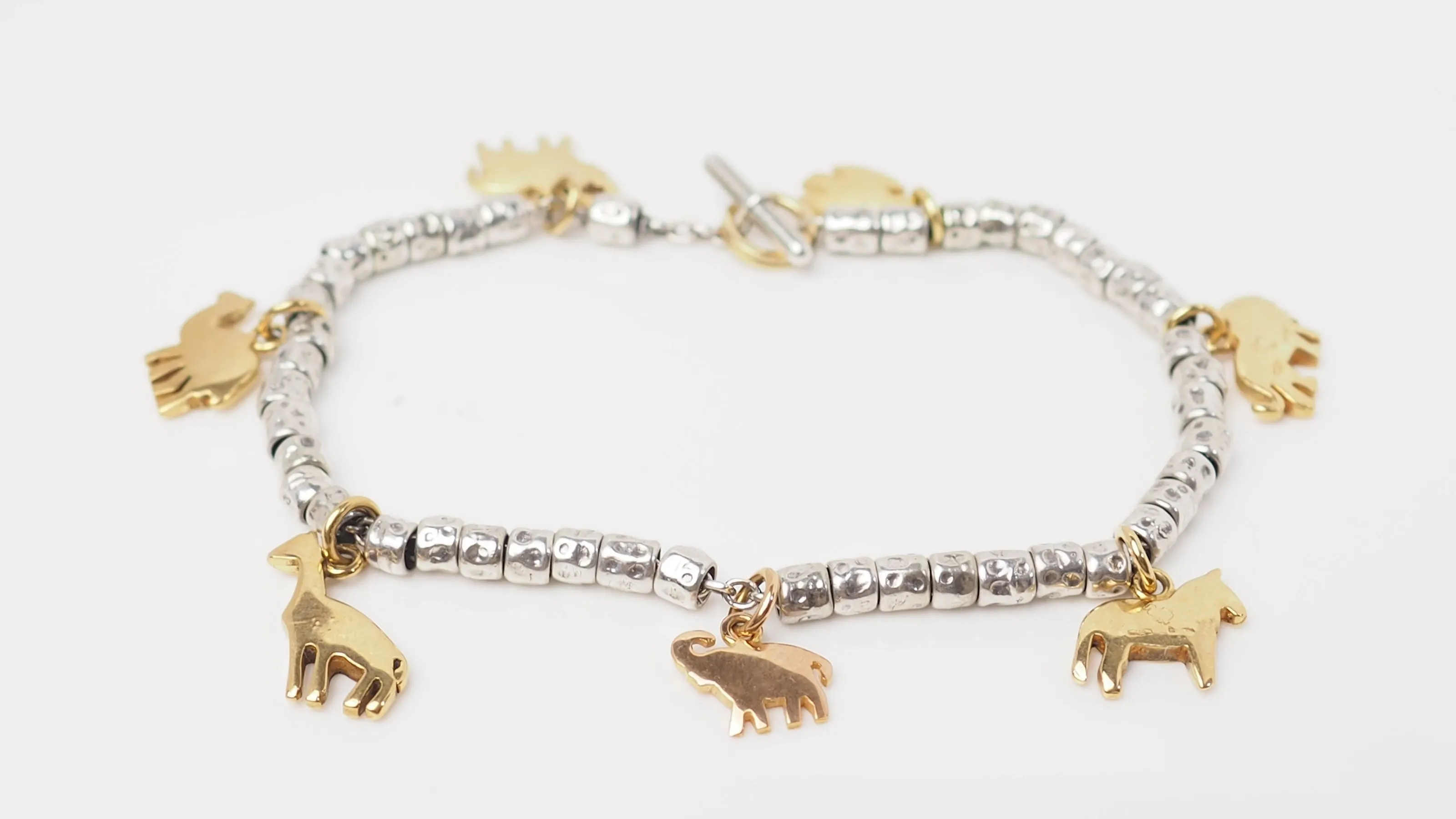 Bracelet breloques Dodo en or jaune et argent sold by 58 Facettes product image thumbnail 4