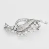 Broche " Gerbe" or gris 18K et diamants sold by 58 Facettes