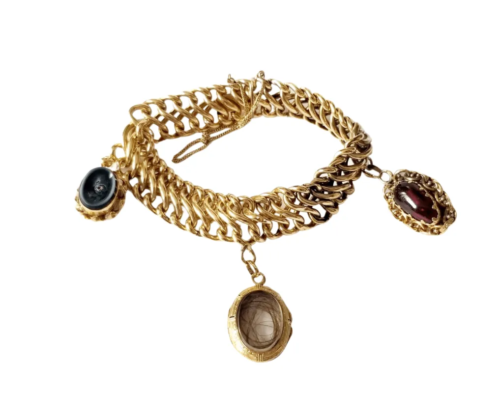 Bracelet maille américaine or jaune et breloques sold by 58 Facettes