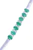 BRACELET ARTICULÉ ÉMERAUDES ET DIAMANTS sold by 58 Facettes