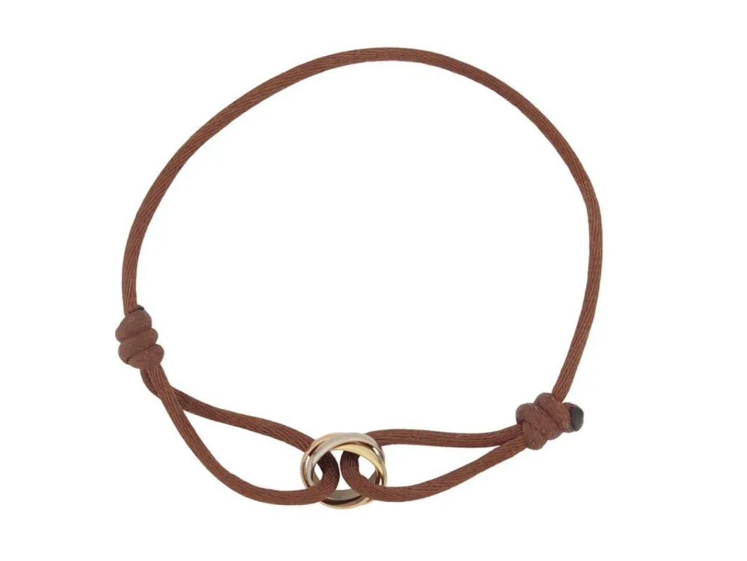 bracelet CARTIER trinity or jaune blanc et rose 16-25 sold by 58 Facettes