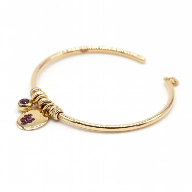 Bracelet en or jaune, diamants et rubis sold by 58 Facettes