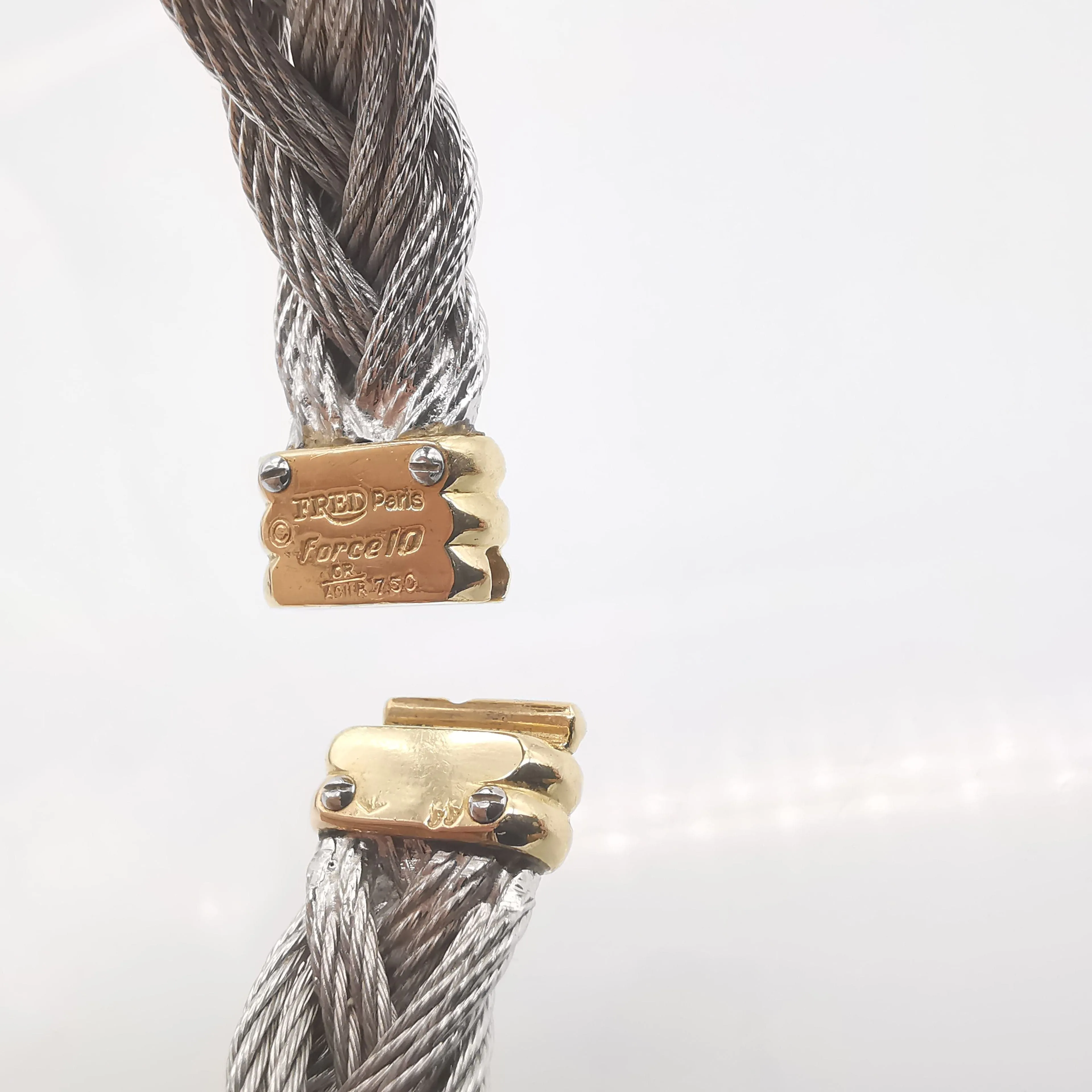 FRED - vintage bracelet Force 10 câble acier et or jaune sold by 58 Facettes product image thumbnail 5