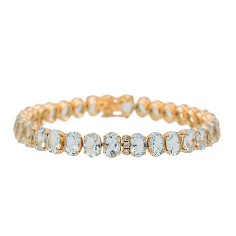 Bracelet en or rose 18 carats avec aigue-marines et diamants made by 58 Facettes
