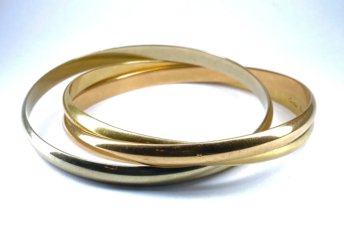 CARTIER - bracelet Trinity en or jaune, rose , blanc signé et numéroté sold by 58 Facettes