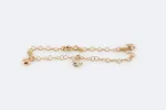 Bracelet en or jaune avec étoiles et coeurs sold by 58 Facettes