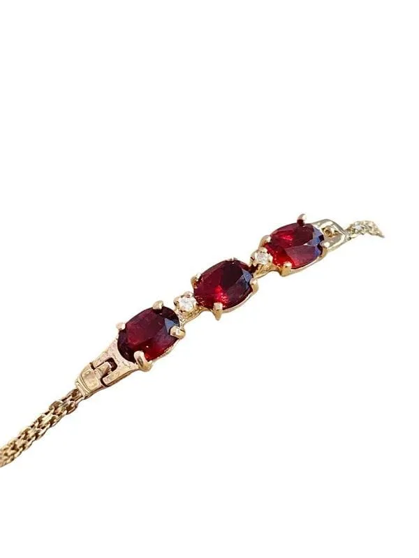 Bracelet en or jaune grenats et diamants sold by 58 Facettes