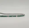 Rivière or blanc sertie de diamants et émeraudes sold by 58 Facettes