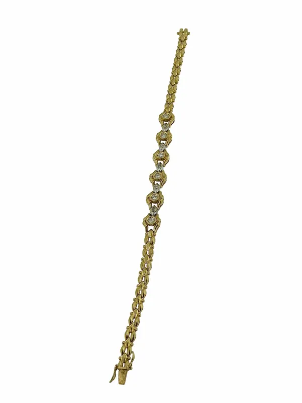 Bracelet rétro deux ors avec diamants certifié HRD sold by 58 Facettes