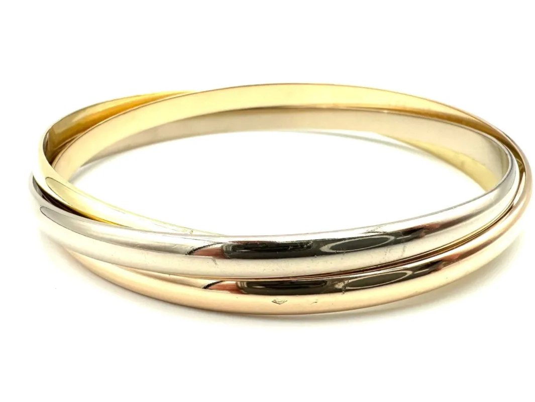 CARTIER. Bracelet Trinity vintage 3 ors 18K MM sold by 58 Facettes